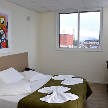 Hotel Buganville Express Castro Quarto foto